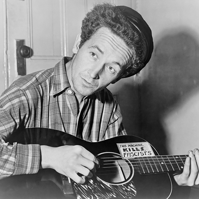 Woody Guthrie Autograph Profile