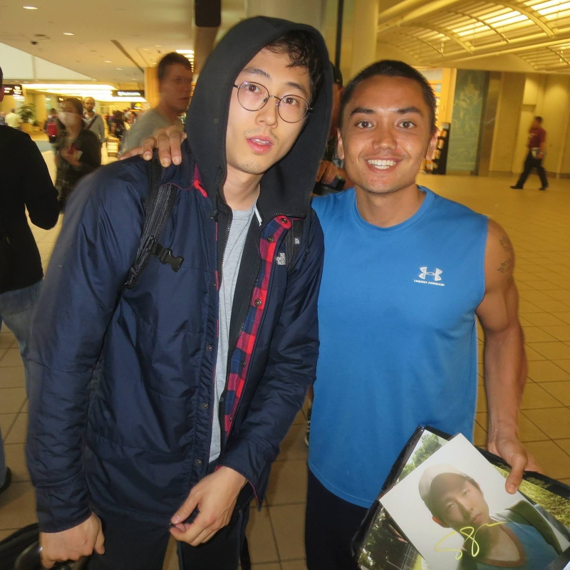 Steven Yeun Photo with RACC Autograph Collector Blue Line Signatures