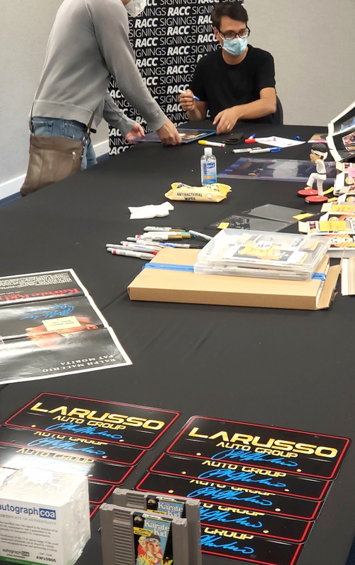 Ralph Macchio Signing Autographs for RACC Autograph Collector Framing History Ralph Macchio Signing Autograph for RACC Autograph Collector Framing History