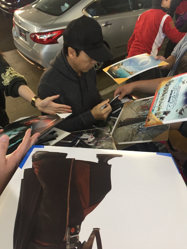 Donnie Yen Signing Autograph for RACC Autograph Collector Mike Schreiber
