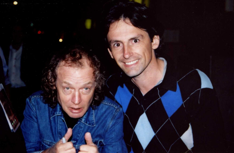 Angus Young Photo with RACC Autograph Collector CB Autographs