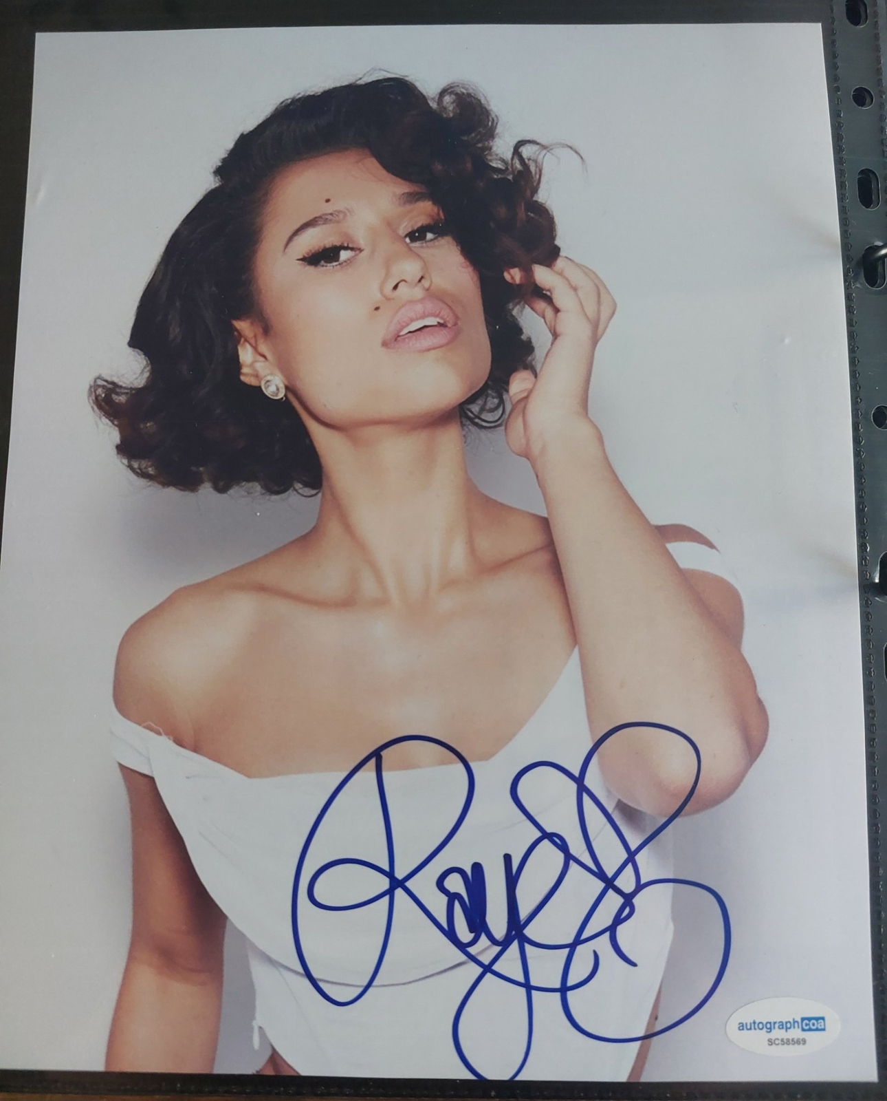 Raye signed item