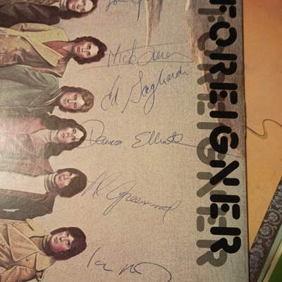 The original 6 founding band members of Foreigner & Foreigner signed vinyl / lp