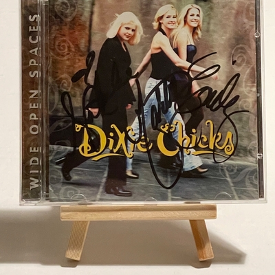Dixie Chicks - Wide Open Spaces CD. Signed by Emily Strayer, Natalie Maines and Martie Maguire and again by Emilie Strayer on rear cover