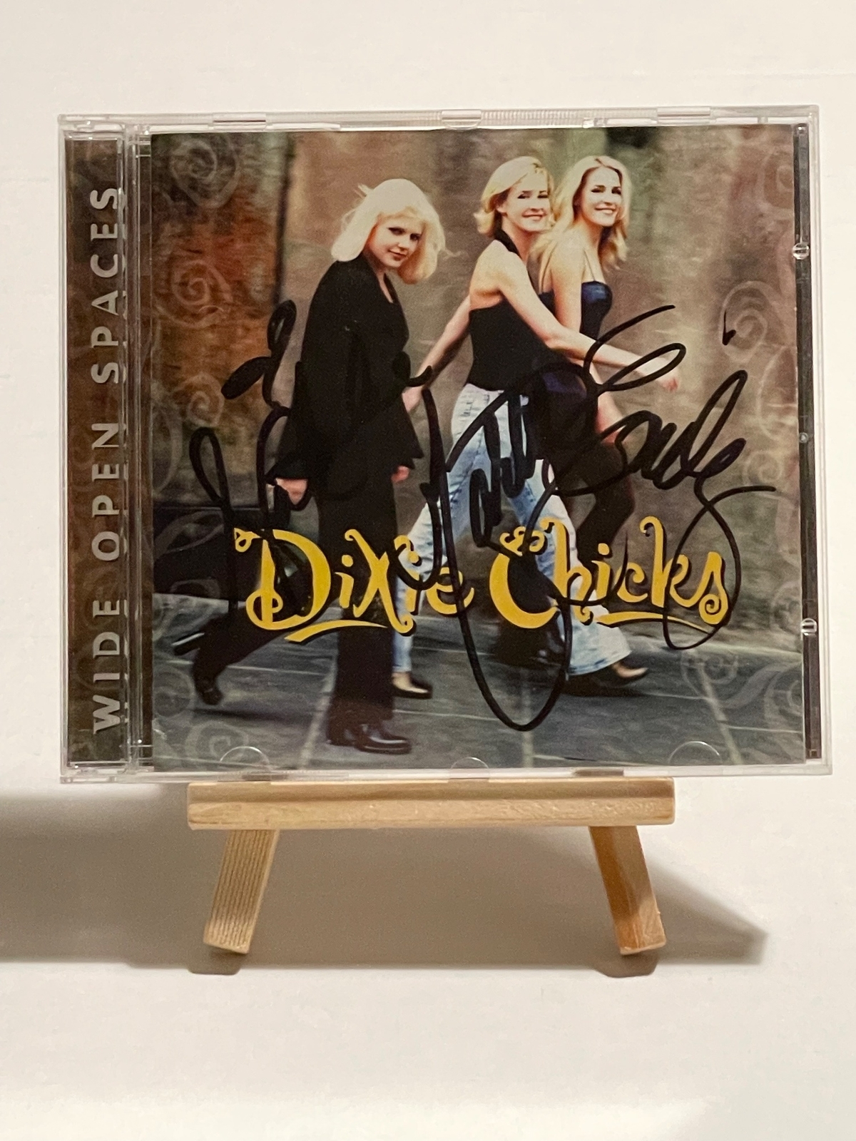 Dixie Chicks - Wide Open Spaces CD. Signed by Emily Strayer, Natalie Maines and Martie Maguire and again by Emilie Strayer on rear cover