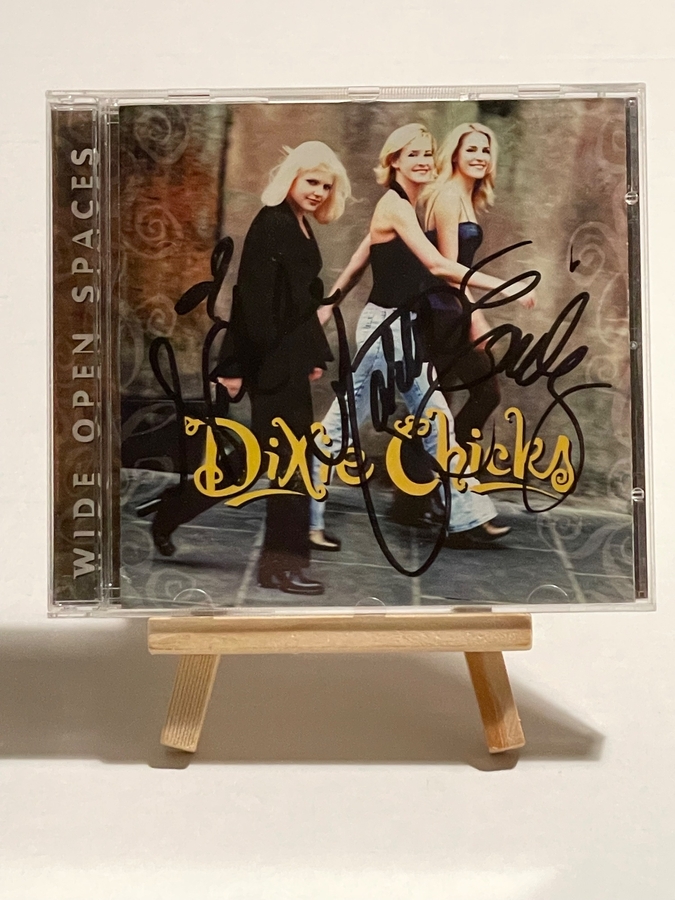 Dixie Chicks - Wide Open Spaces CD. Signed by Emily Strayer, Natalie Maines and Martie Maguire and again by Emilie Strayer on rear cover