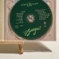 The Steve Miller Band - Bingo CD. Signed by Steve Miller, Kenny Lee, Sonny Charles, Joseph Wooten and Gordy Knudtston