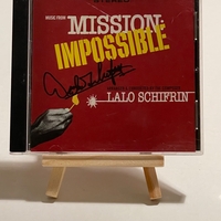 Music from Mission Impossible CD. Signed by Lalo Schifrin