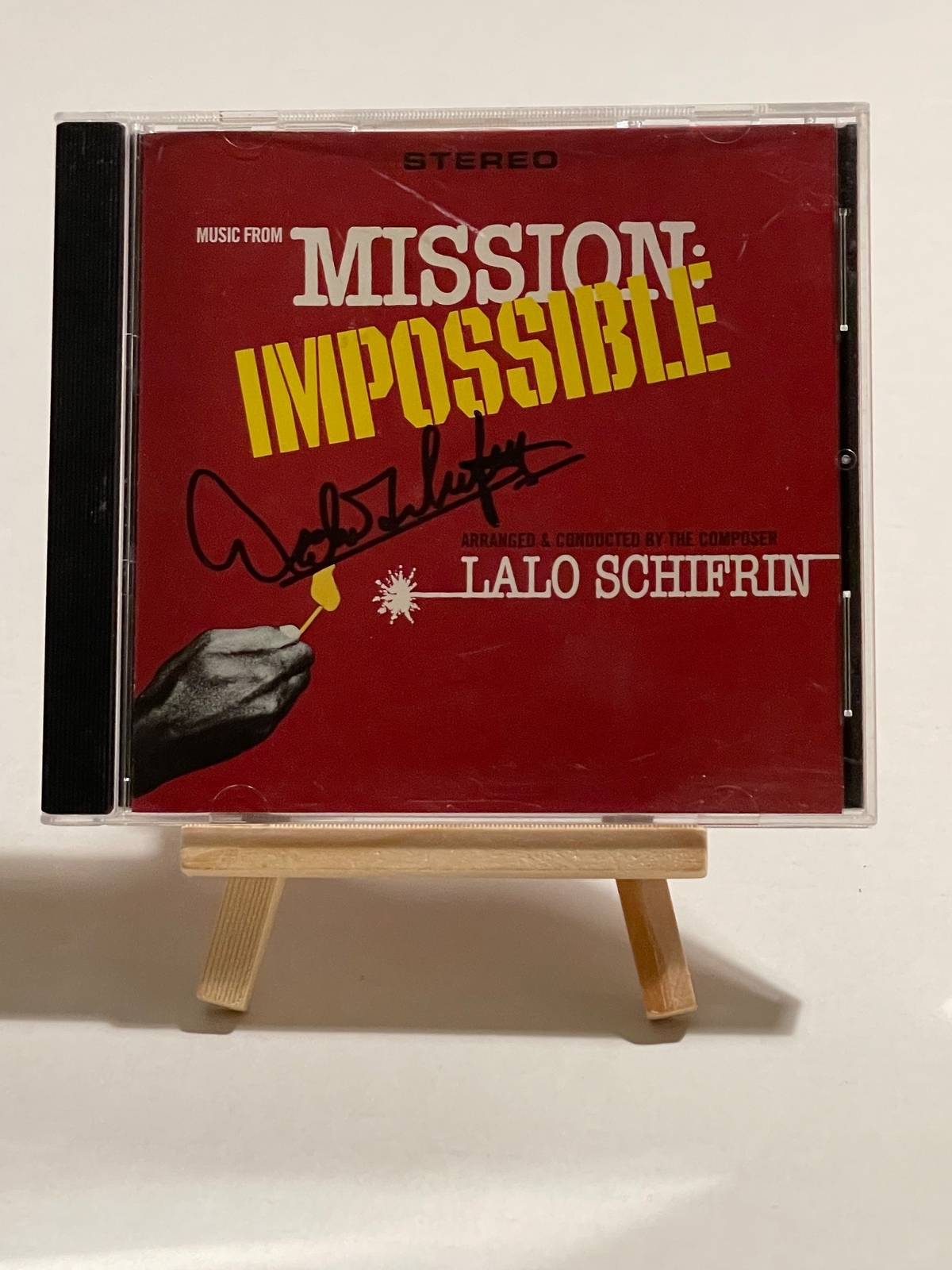Music from Mission Impossible CD. Signed by Lalo Schifrin