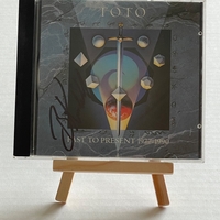 Toto - Past To Present CD. Signed by Bobby Kimball