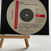 Toto - Past To Present CD. Signed by Bobby Kimball