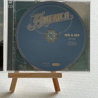 America - Here & Now CD. Signed by Dewey Bunnell and Gerry Beckley
