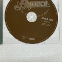 America - Here & Now CD. Signed by Dewey Bunnell and Gerry Beckley