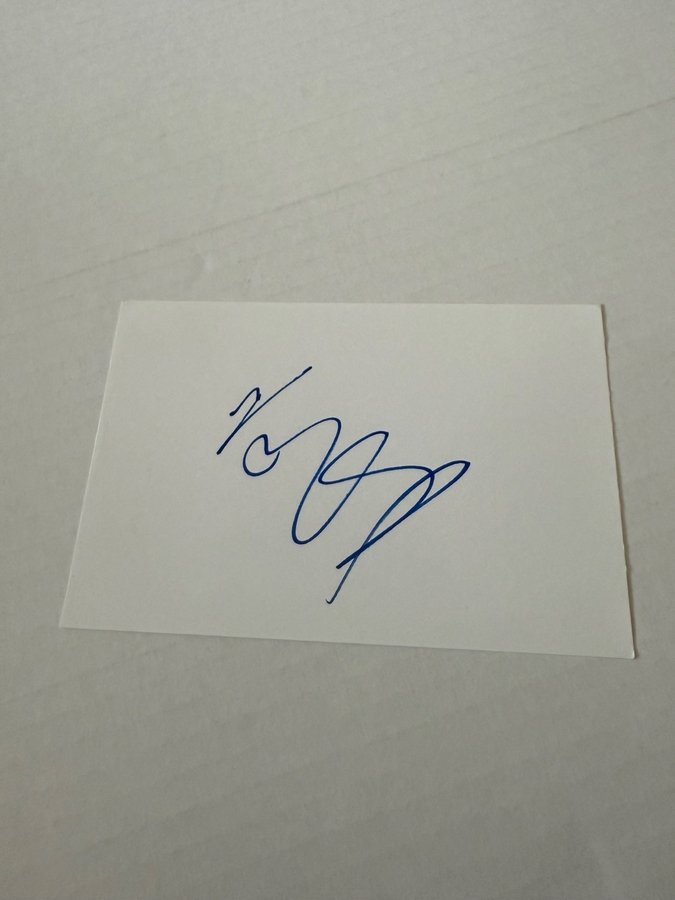 Simon Webb signed piece of paper