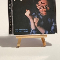 Joe Jackson - This Us It CD. Signed by Joe Jackson