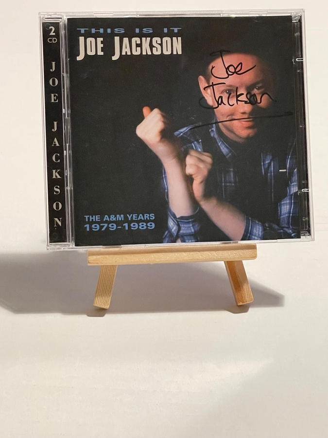 Joe Jackson - This Us It CD. Signed by Joe Jackson