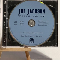 Joe Jackson - This Us It CD. Signed by Joe Jackson