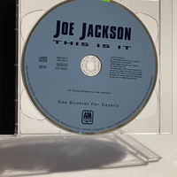 Joe Jackson - This Us It CD. Signed by Joe Jackson