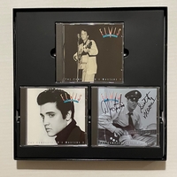 The Complete 50’s Masters Box set. With book signed by Scotty Moore and DJ Fontana and CD also signed by Scotty Moore and DJ Fontana.
