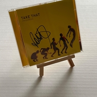 Take That Progress CD. Signed by Robbie Williams