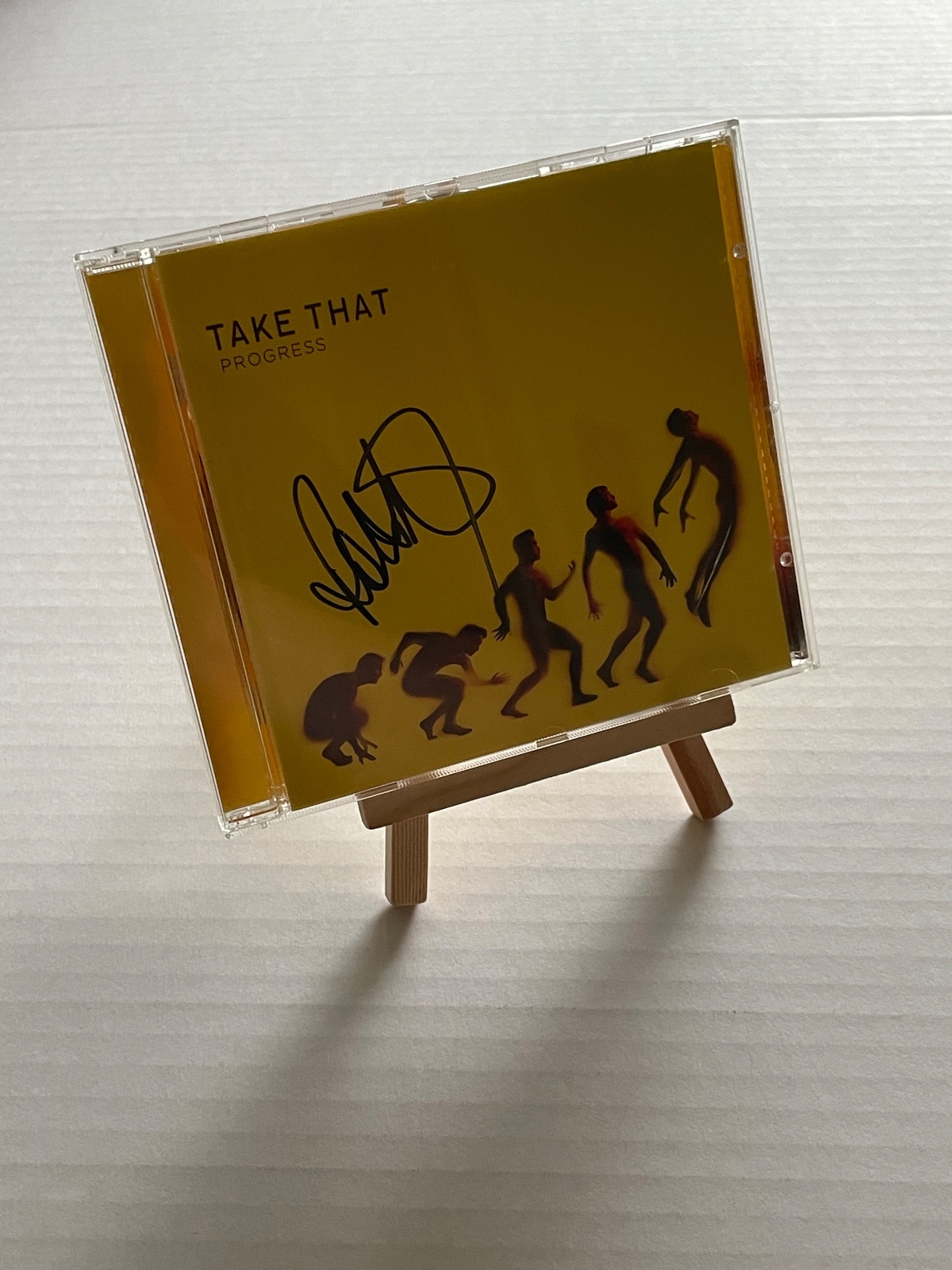 Take That Progress CD. Signed by Robbie Williams