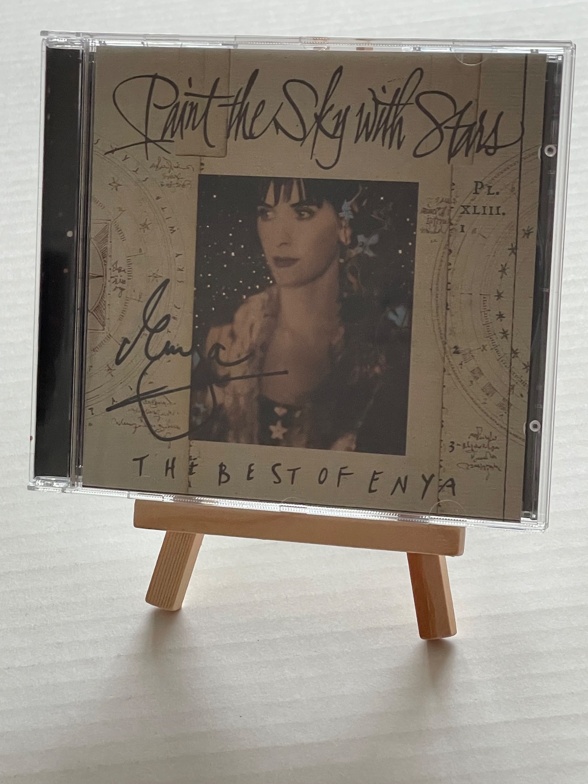 Enya - The Best of Enya CD. Signed by Enya with card also signed by Enya