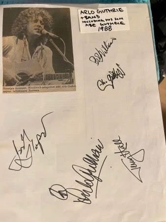 Arlo Guthrie & band signed paper