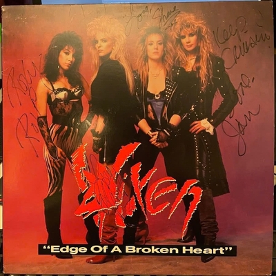 Vixen signed vinyl cover