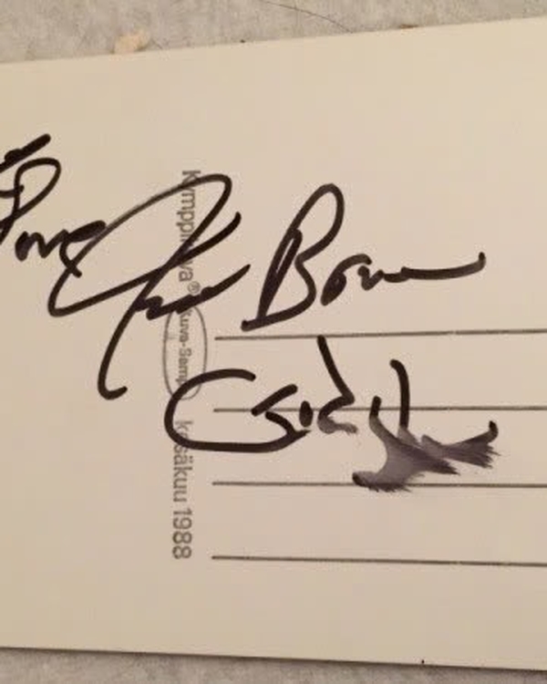 James Brown signed back of photo