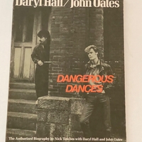 Daryl Hall and John Oates - Dangerous Dances paperback book. Personalised to Nigel, signed by John Oates