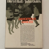 Daryl Hall and John Oates - Dangerous Dances paperback book. Personalised to Nigel, signed by John Oates