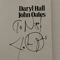 Daryl Hall and John Oates - Dangerous Dances paperback book. Personalised to Nigel, signed by John Oates