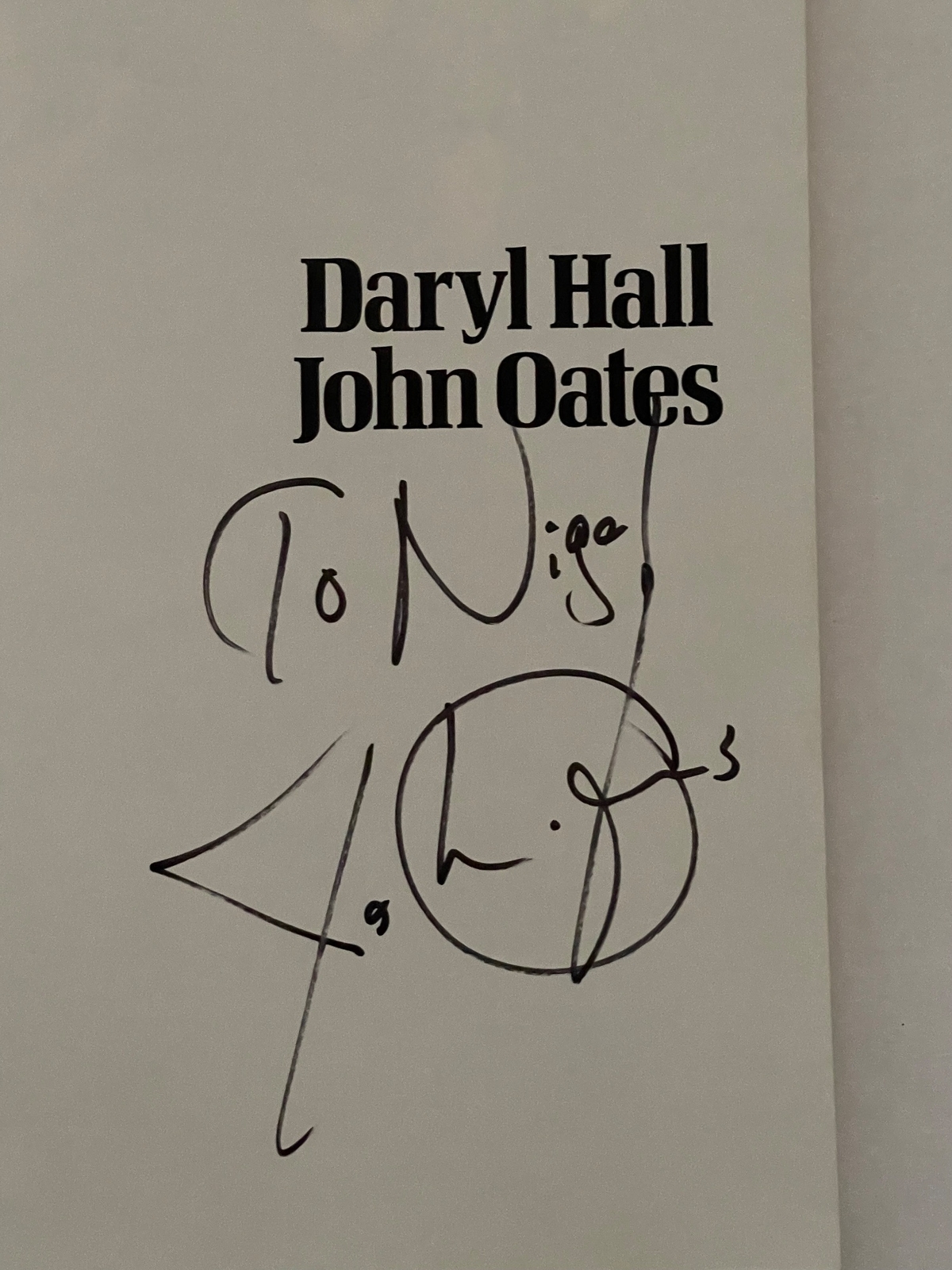 Daryl Hall and John Oates - Dangerous Dances paperback book. Personalised to Nigel, signed by John Oates