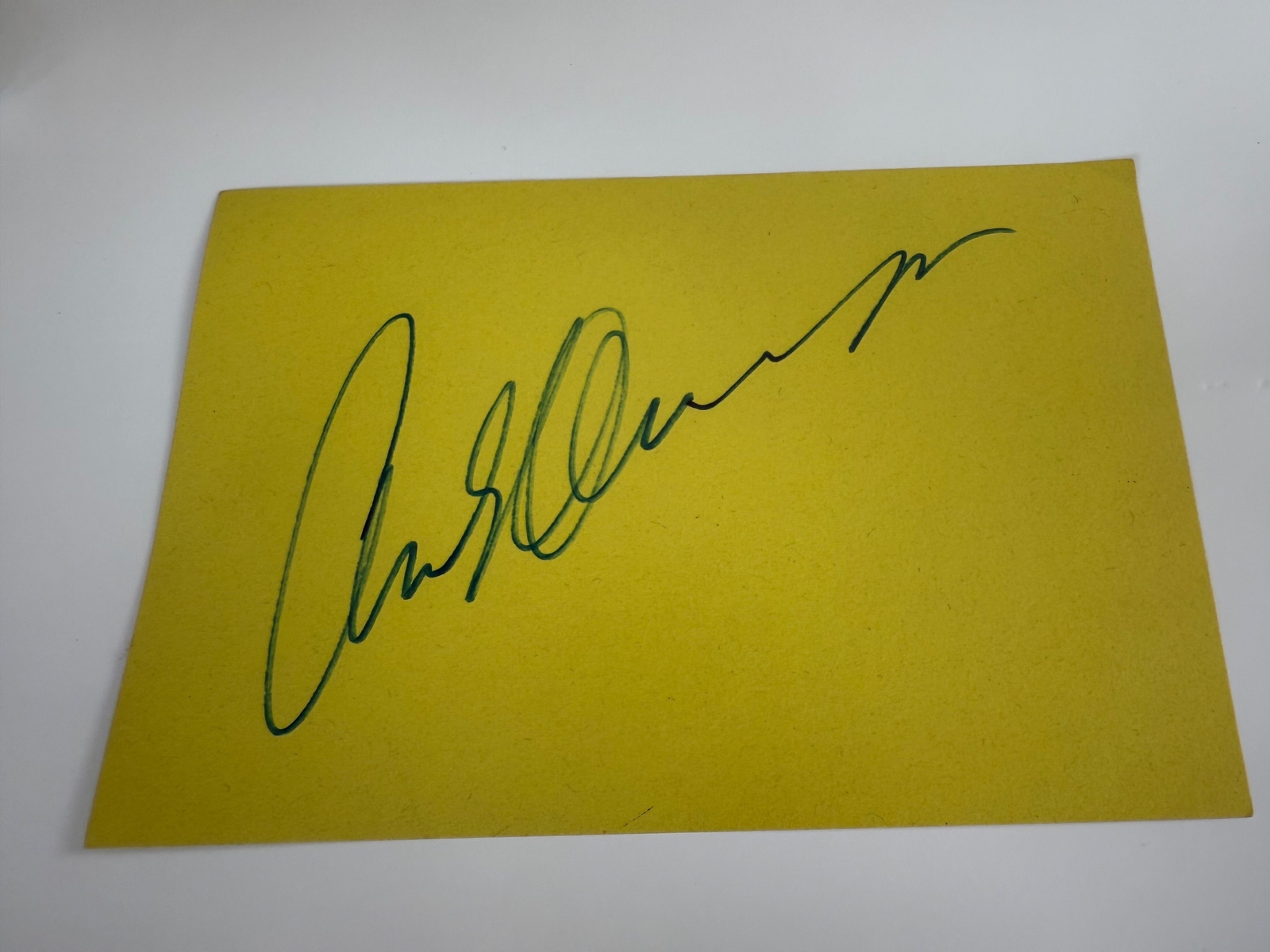 Arnold Swarzenegger signed card