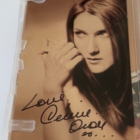 Celine Dion - signed DVD collection. Signed on outer cover (slight damage) and booklet by Celine Dion