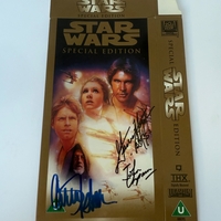 Star Wars Special Edition VHS cover signed by Carrie Fisher, Garrick Hagon “Biggs” and John Chapman (Drifter - Red 12)
