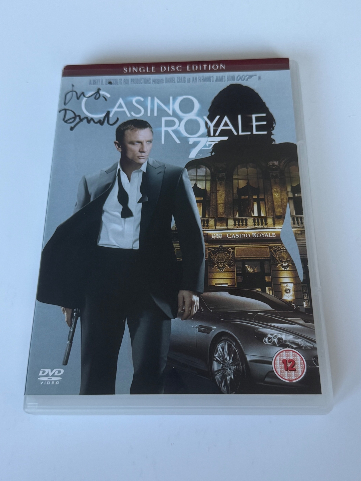 Casino Royale DVD cover signed by Judi Dench