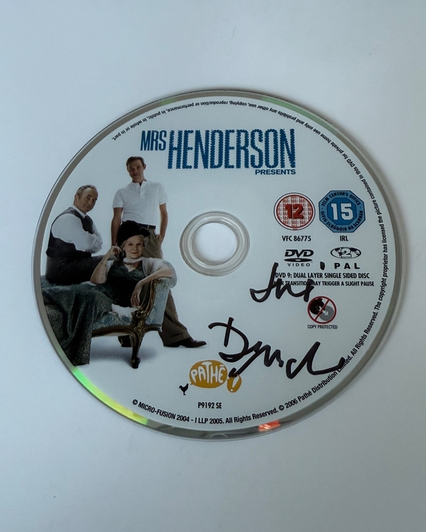 Mrs Henderson Presents DVD disc signed by Judi Dench. Disc only