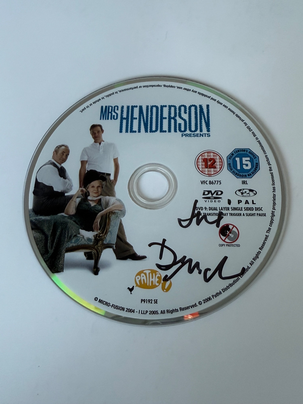 Mrs Henderson Presents DVD disc signed by Judi Dench. Disc only