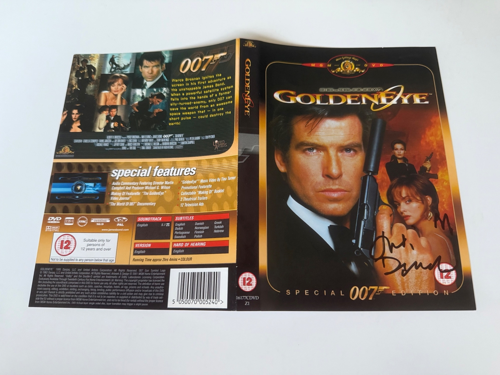 Goldeneye DVD cover signed by Judi Dench. DVD sleeve only