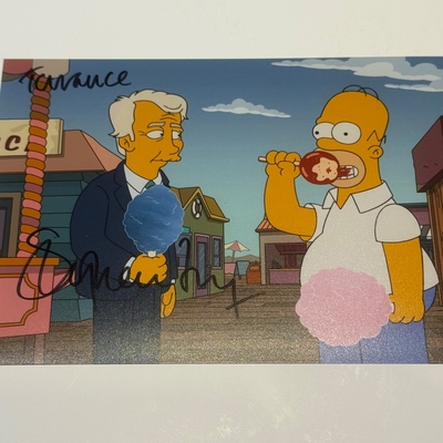 Simpsons photo signed by Stephen Fry.