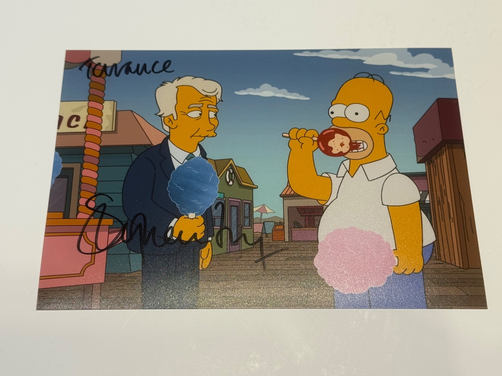 Simpsons photo signed by Stephen Fry.