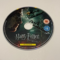 Harry Potter and The Deathly Hallows Part 2 DVD disc signed by Julie Walters and Mark Williams. Disc only