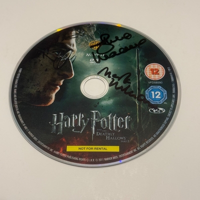 Harry Potter and The Deathly Hallows Part 2 DVD disc signed by Julie Walters and Mark Williams. Disc only