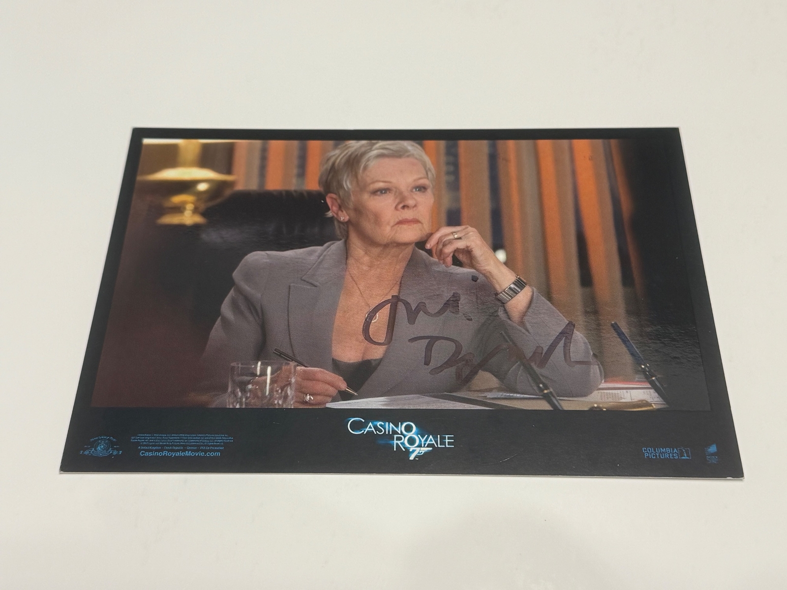 Casino Royale photo signed by Judi Dench.
