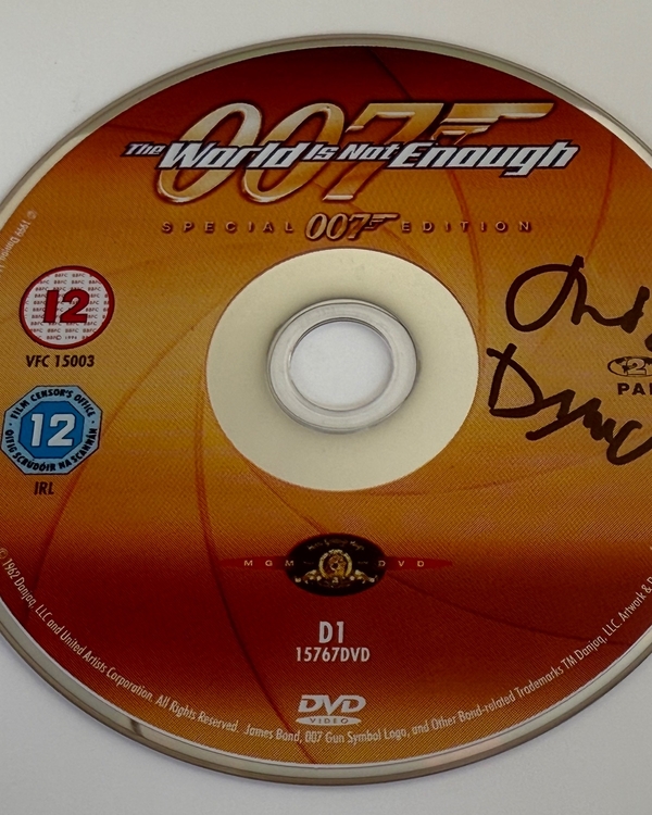 The World Is Not Enough DVD - signed by Judi Dench. Disc only