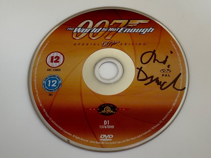 The World Is Not Enough DVD - signed by Judi Dench. Disc only