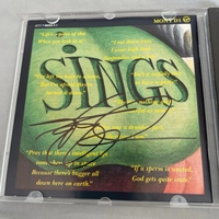 Monty Python sings CD. Signed by Terry Gillam