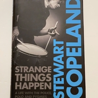 Stewart Copeland signed Strange Things Happen hardback book