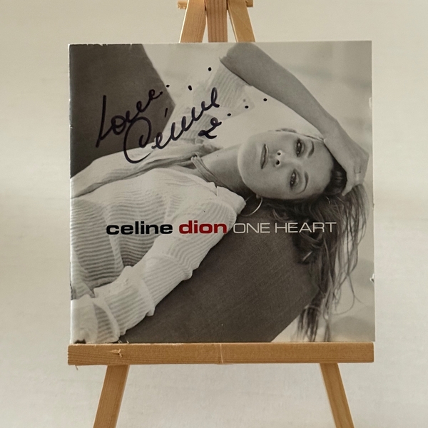 Celine Dion - One Heart CD booklet. Slight indentations/tears